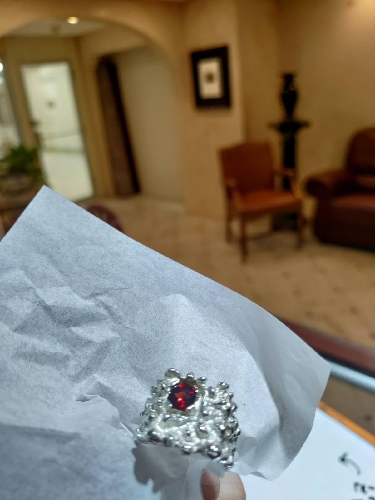 A custom ring set with a pyrope garnet